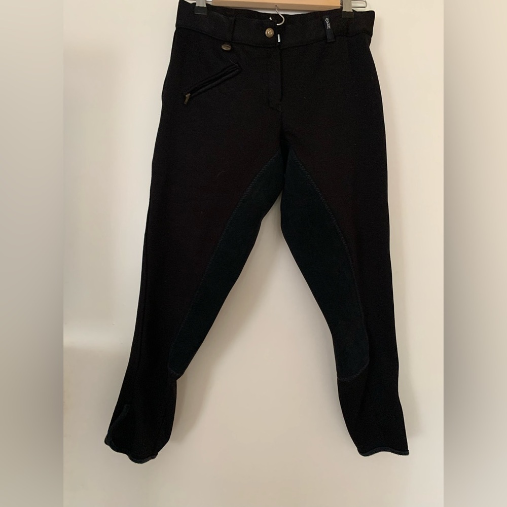 Black Ovation girl’s riding pants size Large with full seat.